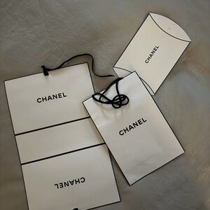 CHANEL Elegant White and Black Bag Trio